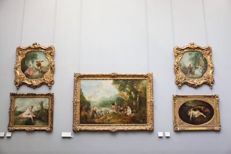 A collection of baroque paintings displayed in a Paris museum, showcasing intricate gold frames and classical art.